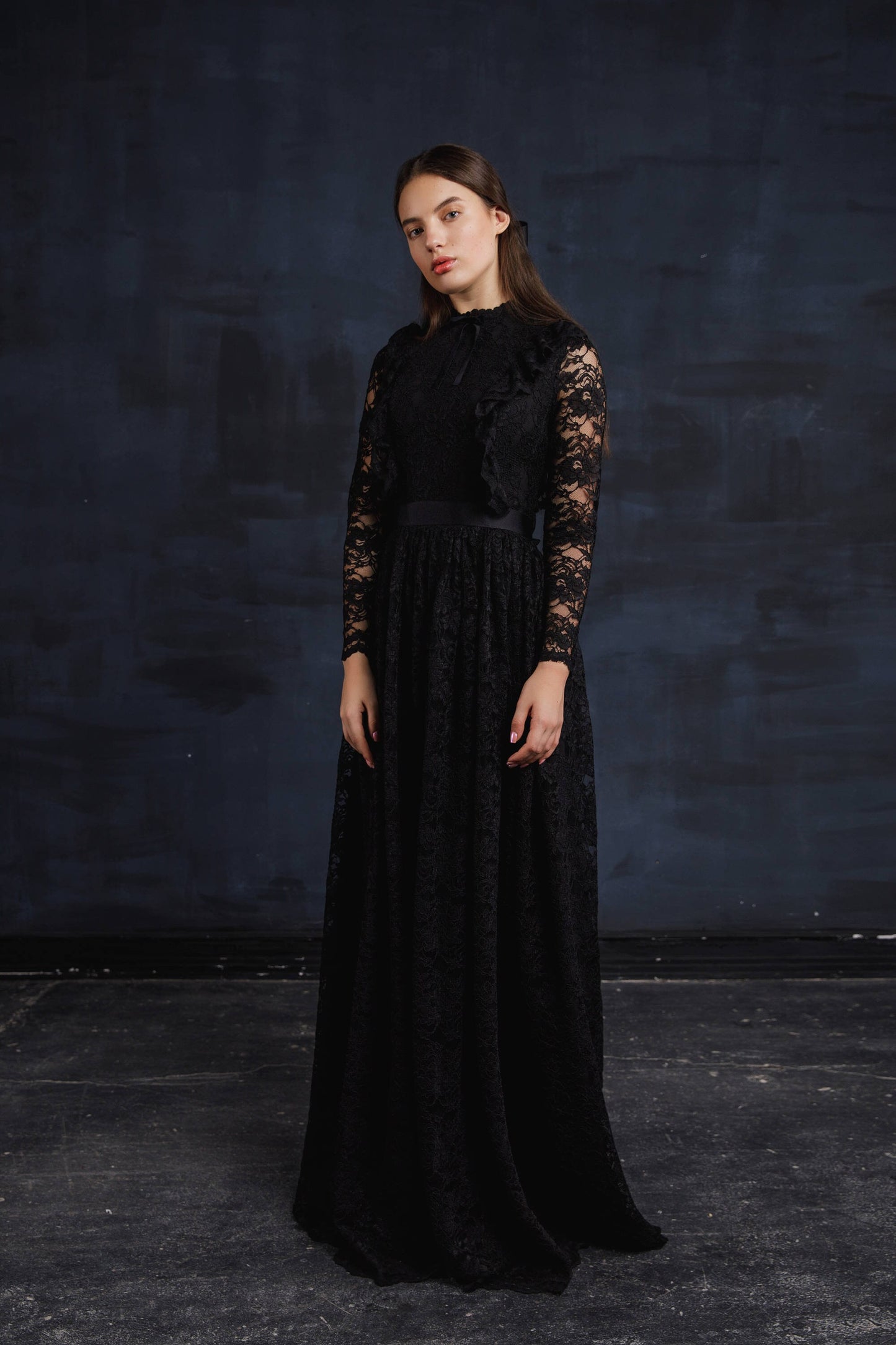gothic wedding dress with long sleeves and fit and flare skirt