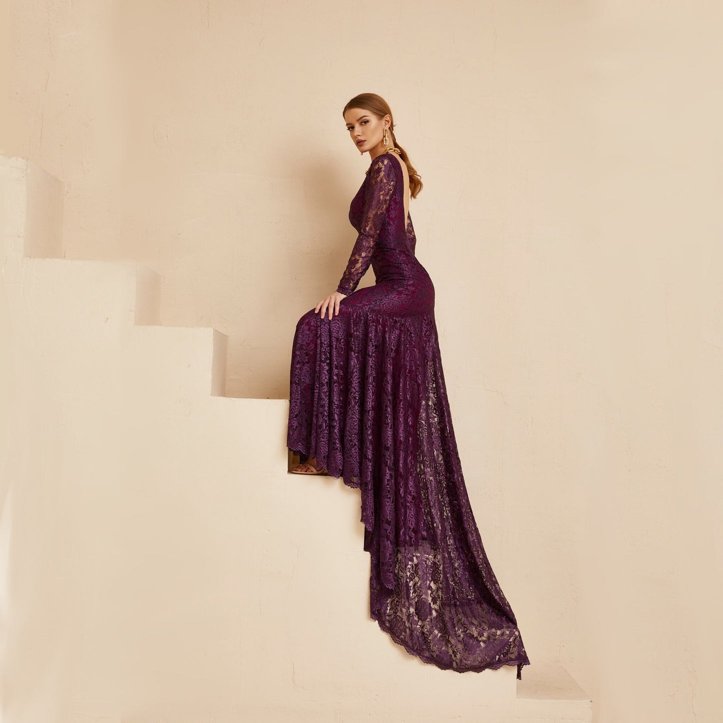 Lace gown purple colour, with long sleeves and open back, mermaid silhouette, long back train. Perfect as alternative wedding dress, as wedding guest outfit or prom gown. The dress made from purple lace and has matching lining.