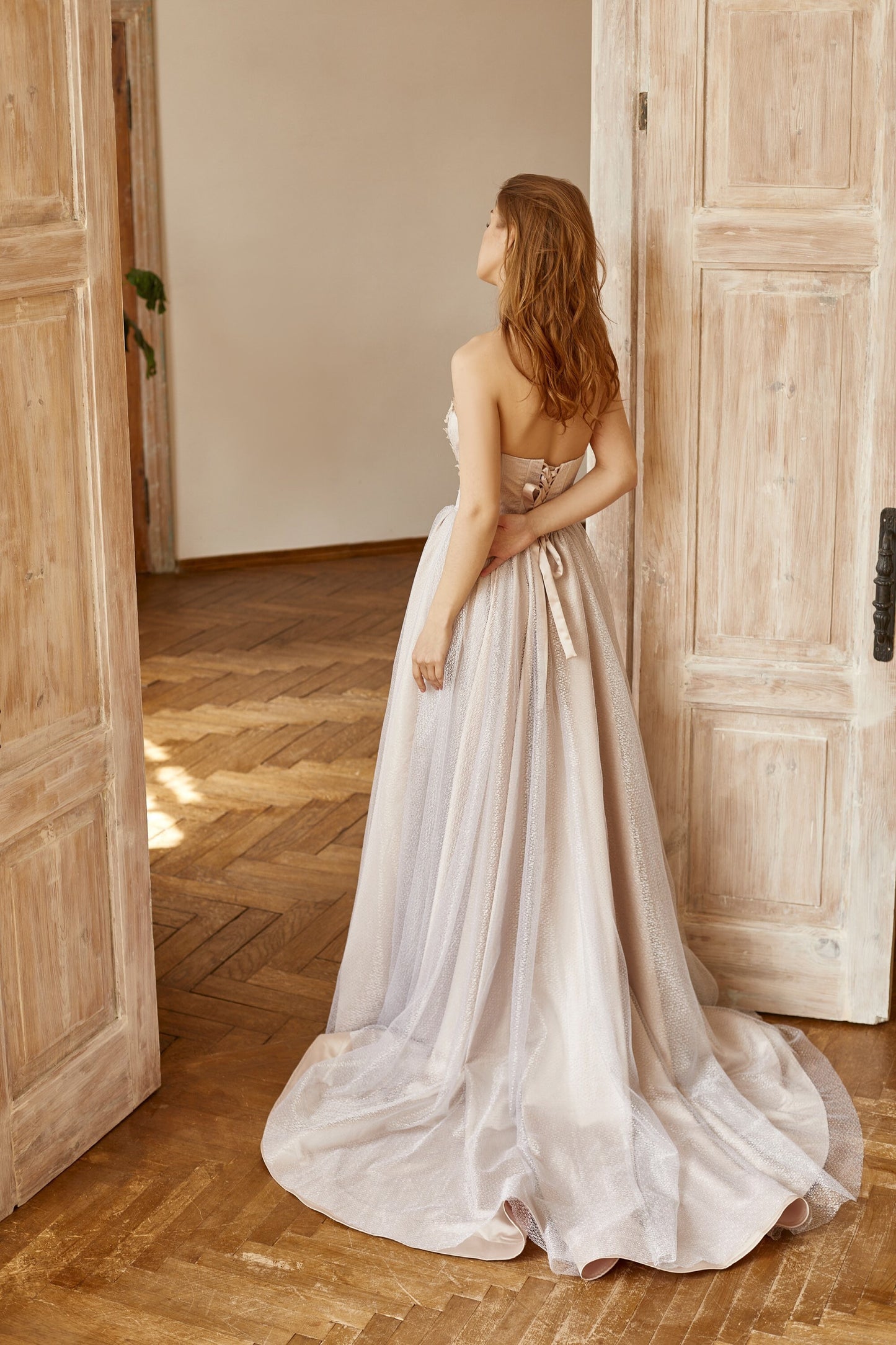 Silver wedding dress with blush lining and floral embroidery, V-shape corset and dramatic train gown, alternative wedding bohemian dress