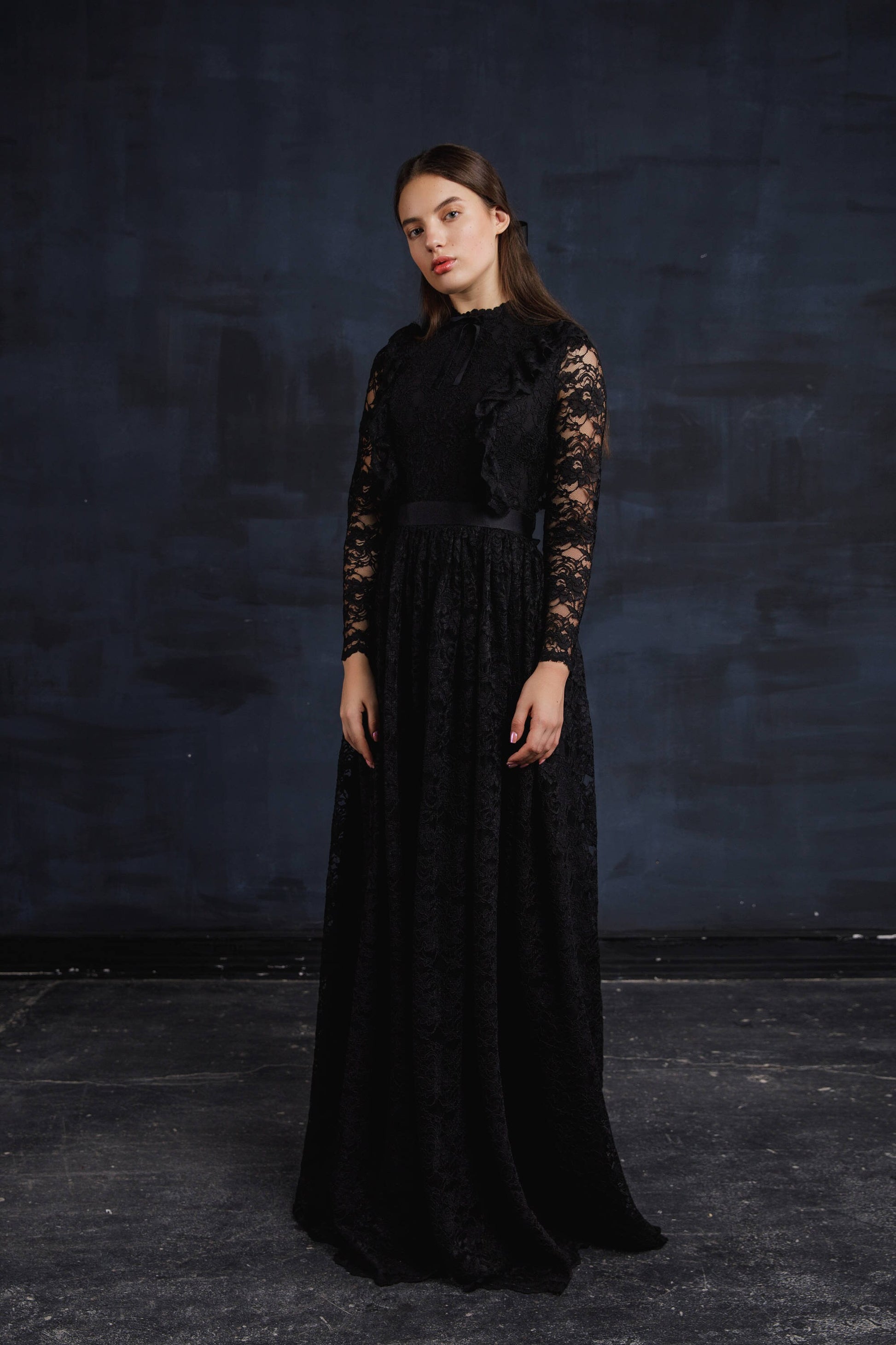 gothic wedding dress with long sleeves and fit and flare skirt