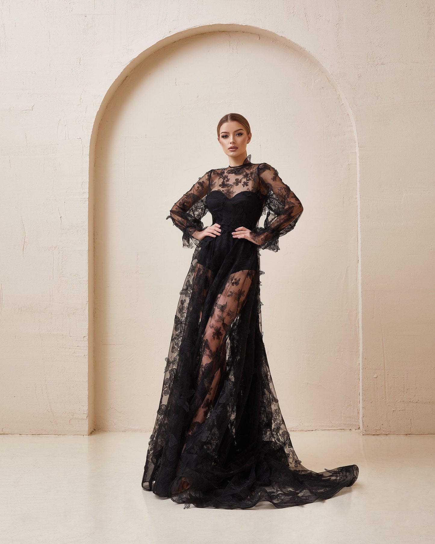 Black wedding dress embroidered with butterflies. Dress with long sleeves is perfect for gothic wedding. The dress is completed by bodysuit. Maxi dress has crew neckline  and dramatic train.