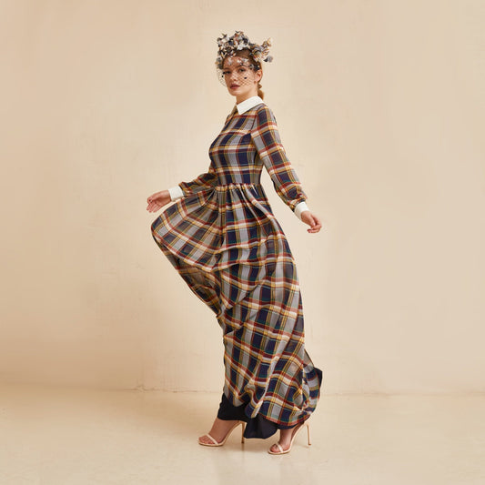 Chiffon tartan dress with long sleeves. With white collar and pearl buttons.