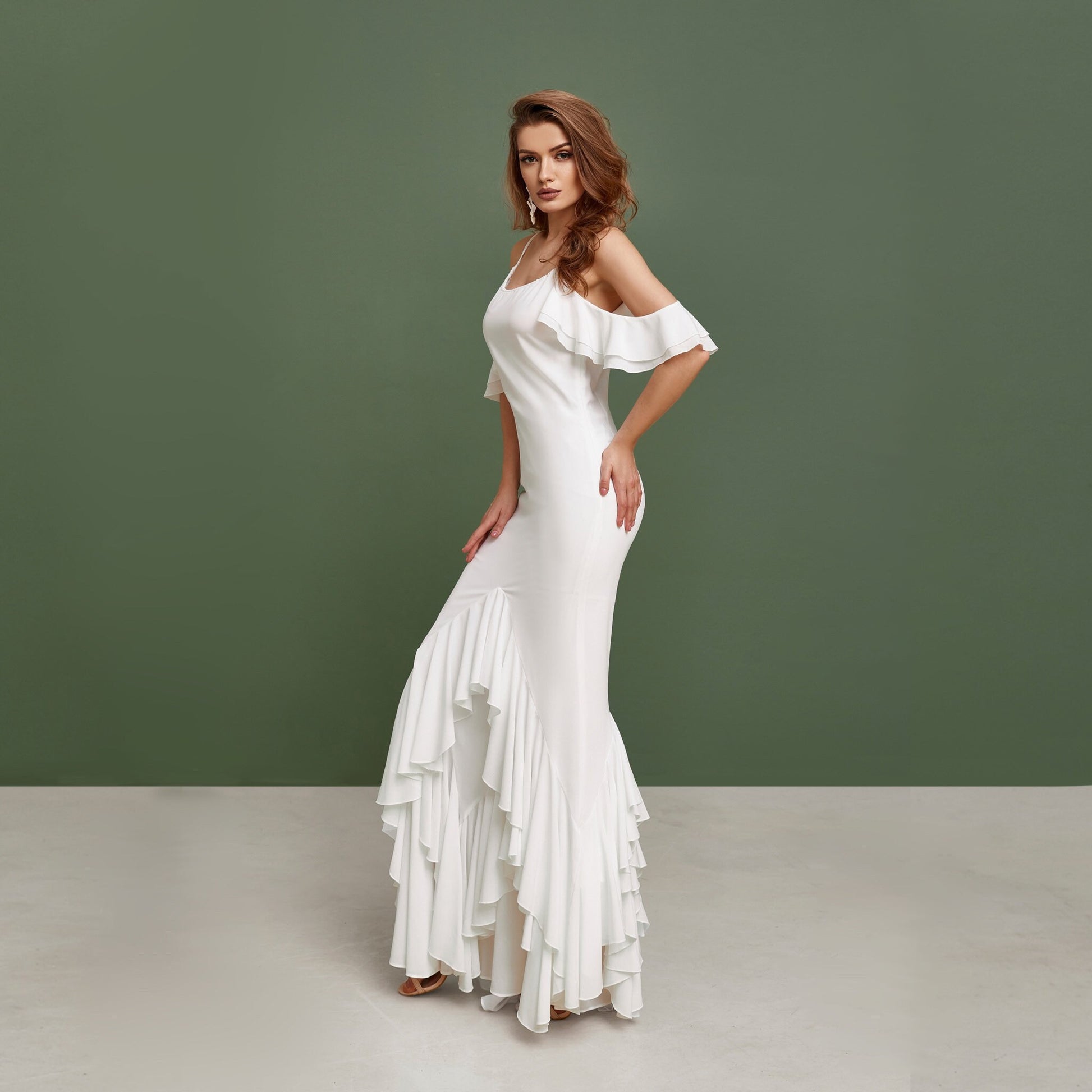 beach wedding pinafore made from white chiffon, with ruffles and floor length skirt.