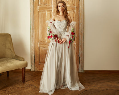 Bohemian wedding dress grey Color lace with detachable  tulle sleeves, and fit and flare grey tulle skirt.
Embroidered with red roses and decorated with red velvet ribbons. Perfect as a prom dress and alternative bride outfit.